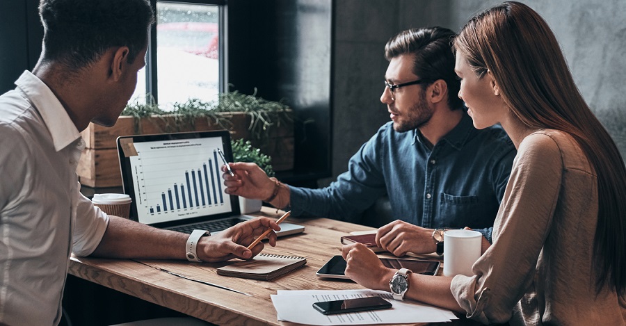 Business people looking at affiliate marketing statistics
