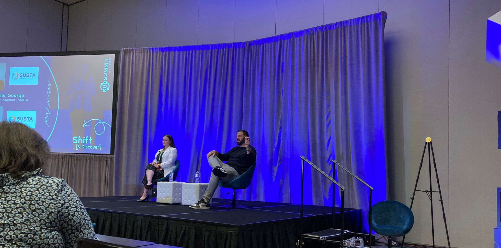 SubSummit co-founder Chris Georga discussing susbcriptions on stage