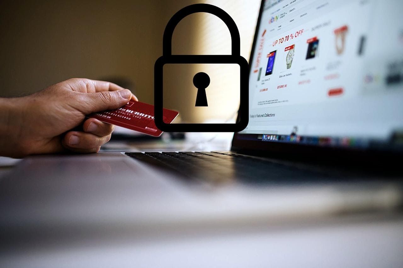 A computer screen and padlock to show headless commerce within ecommerce